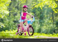 depositphotos_187881298-stock-photo-child-riding-bike-kid-on.jpg