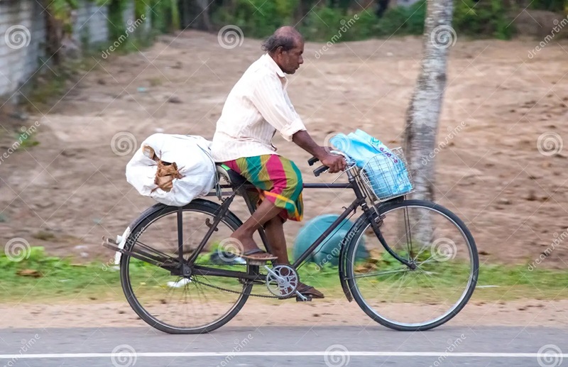 local-man-rides-bicycle-local-road-weligama-sri-lanka-march-cycling-main-transportation-tradit...jpg